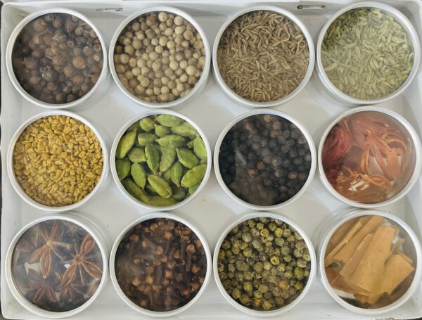 9 different spices stored in small containers